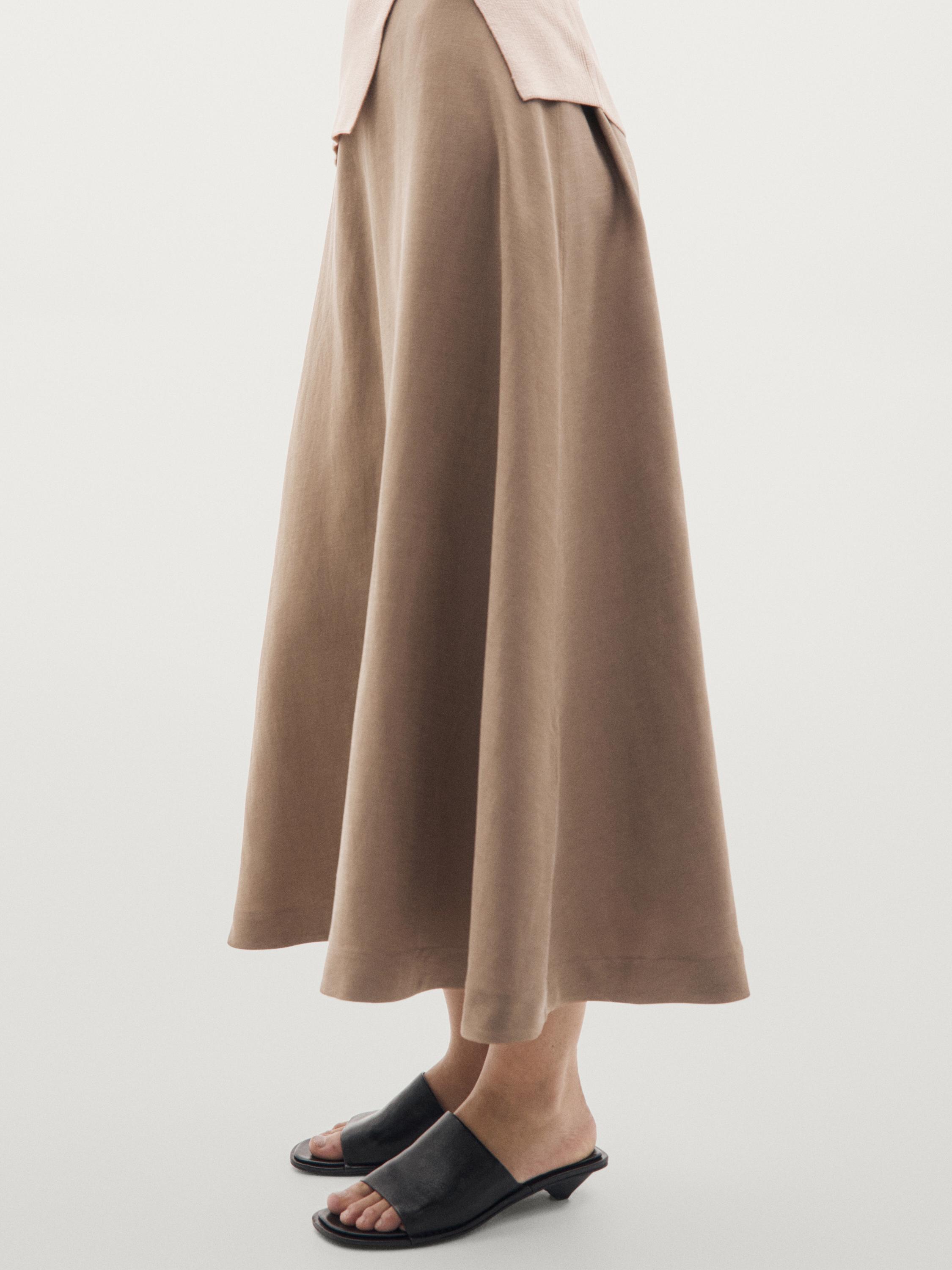 Jupe midi évasée à taille élastique